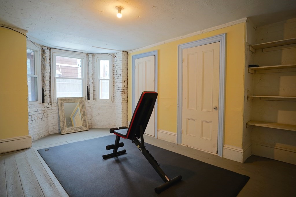 249 Lexington Street, Unit 2 Boston, MA 02128 - Photo 27 of 28 a view of a workspace with furniture and a window