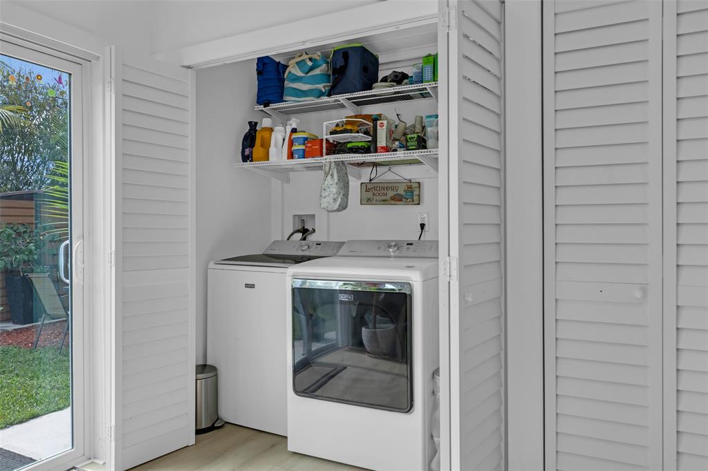 3194 Taft Street Hollywood, FL 33021 - Photo 29 of 48 a utility room with dryer and washer