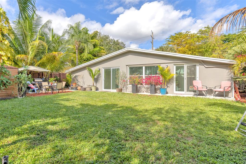 3194 Taft Street Hollywood, FL 33021 - Photo 38 of 48 a view of outdoor space yard and deck