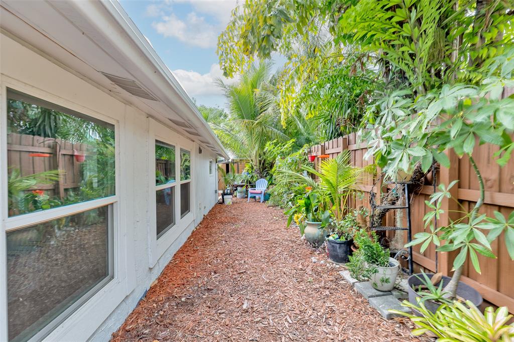 3194 Taft Street Hollywood, FL 33021 - Photo 45 of 48 a view of a garden with pathway
