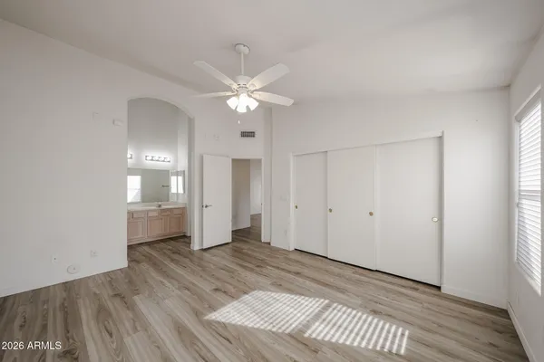 a view of an empty room with a window