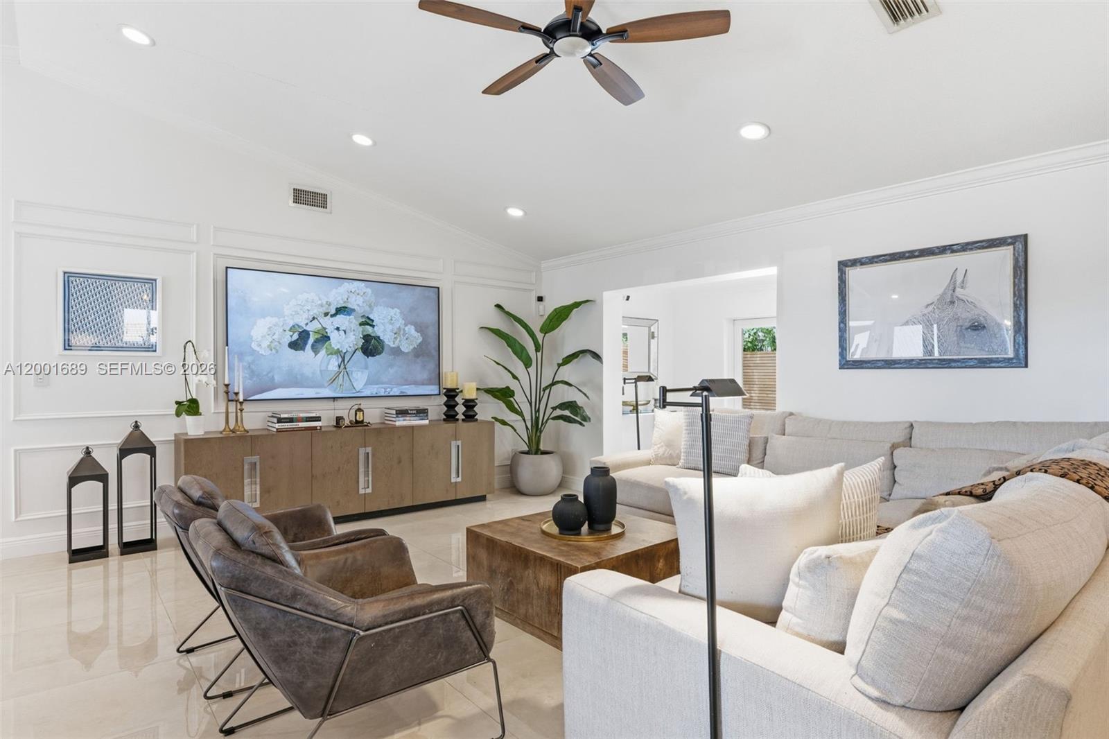 14491 Southwest 161 Street Miami, FL 33177 - Photo 13 of 55 a living room with furniture and a large window