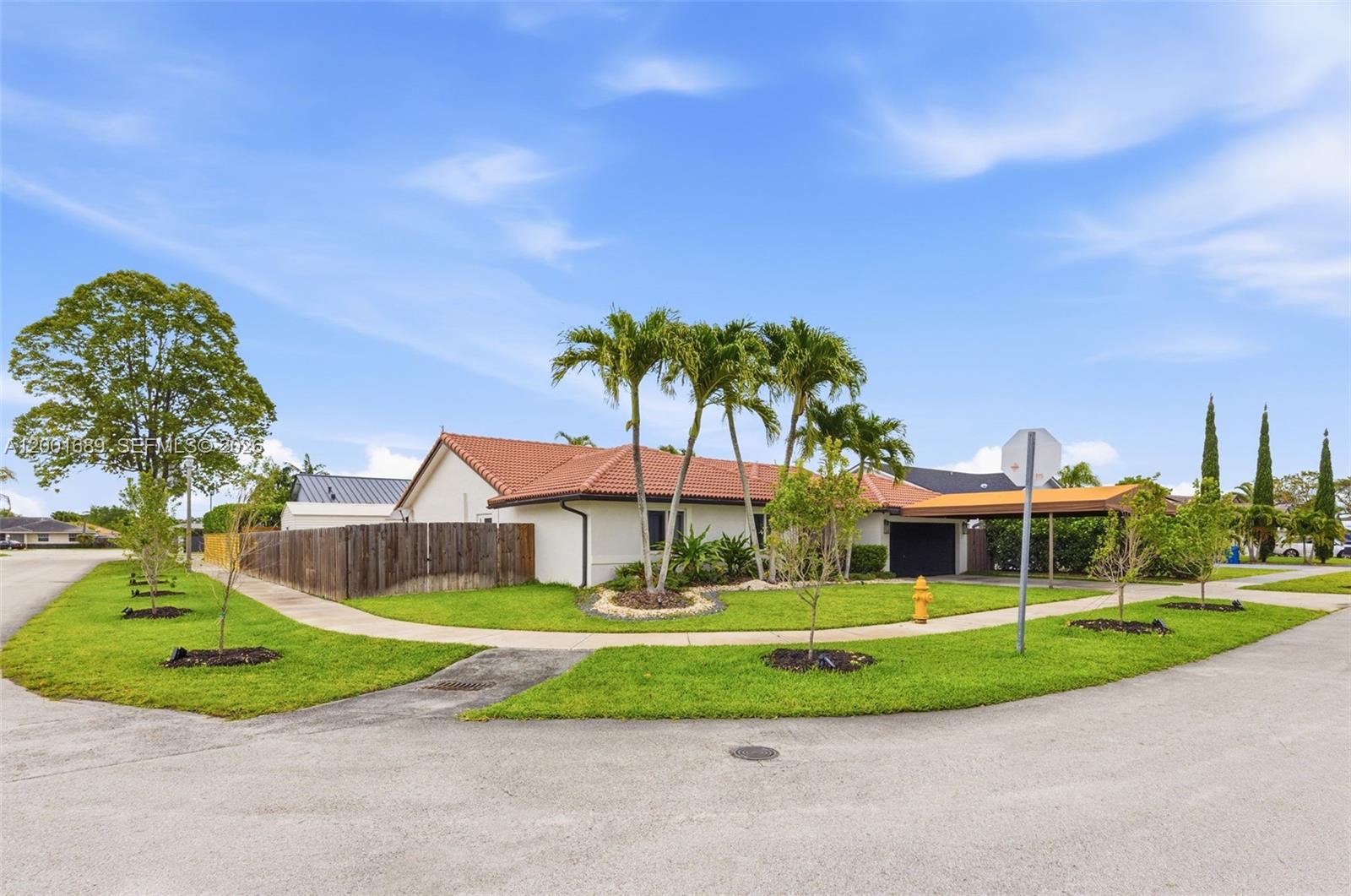 14491 Southwest 161 Street Miami, FL 33177 - Photo 3 of 55 a view of building with yard