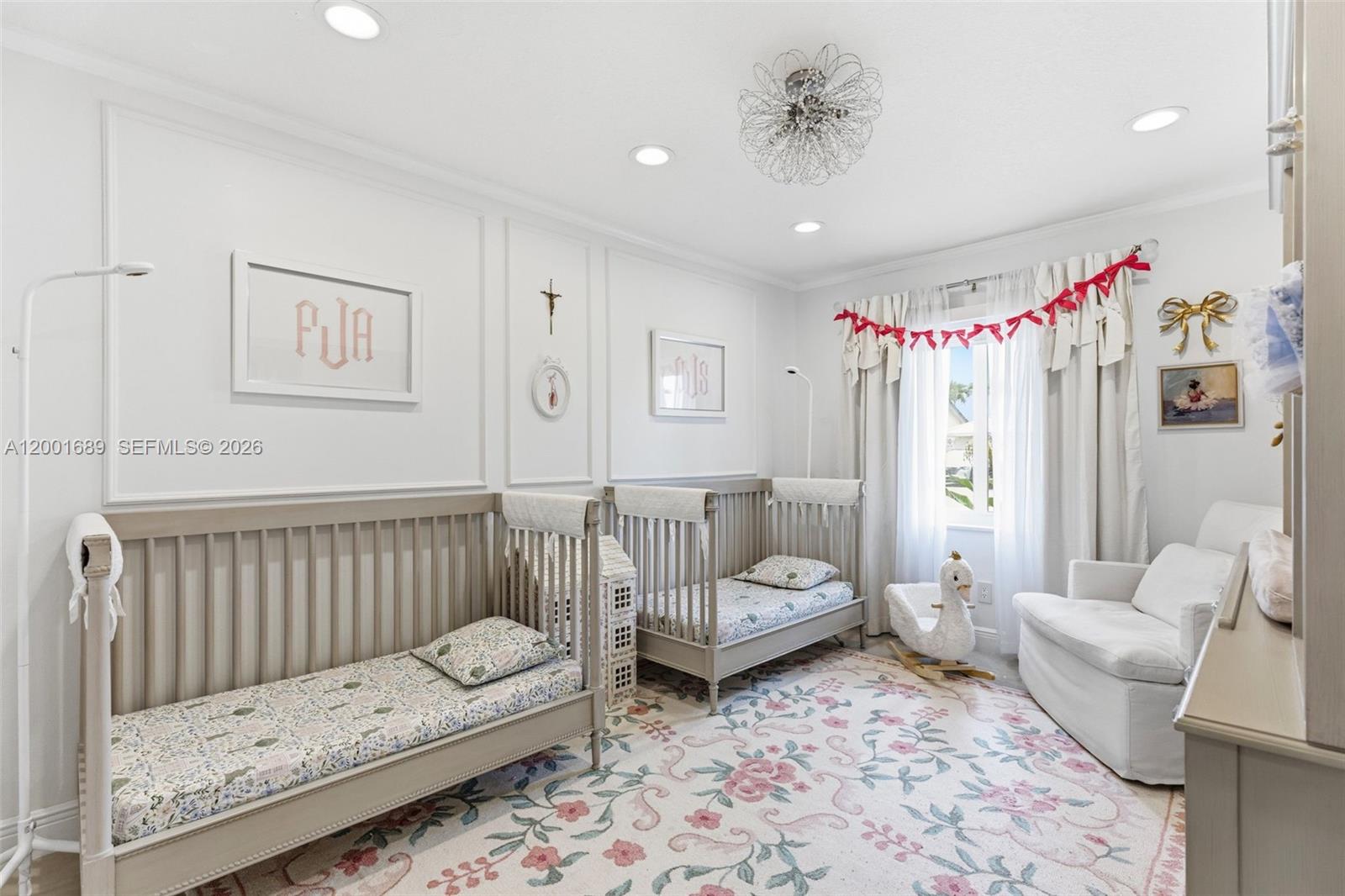 14491 Southwest 161 Street Miami, FL 33177 - Photo 35 of 55 a living room with furniture and a chandelier