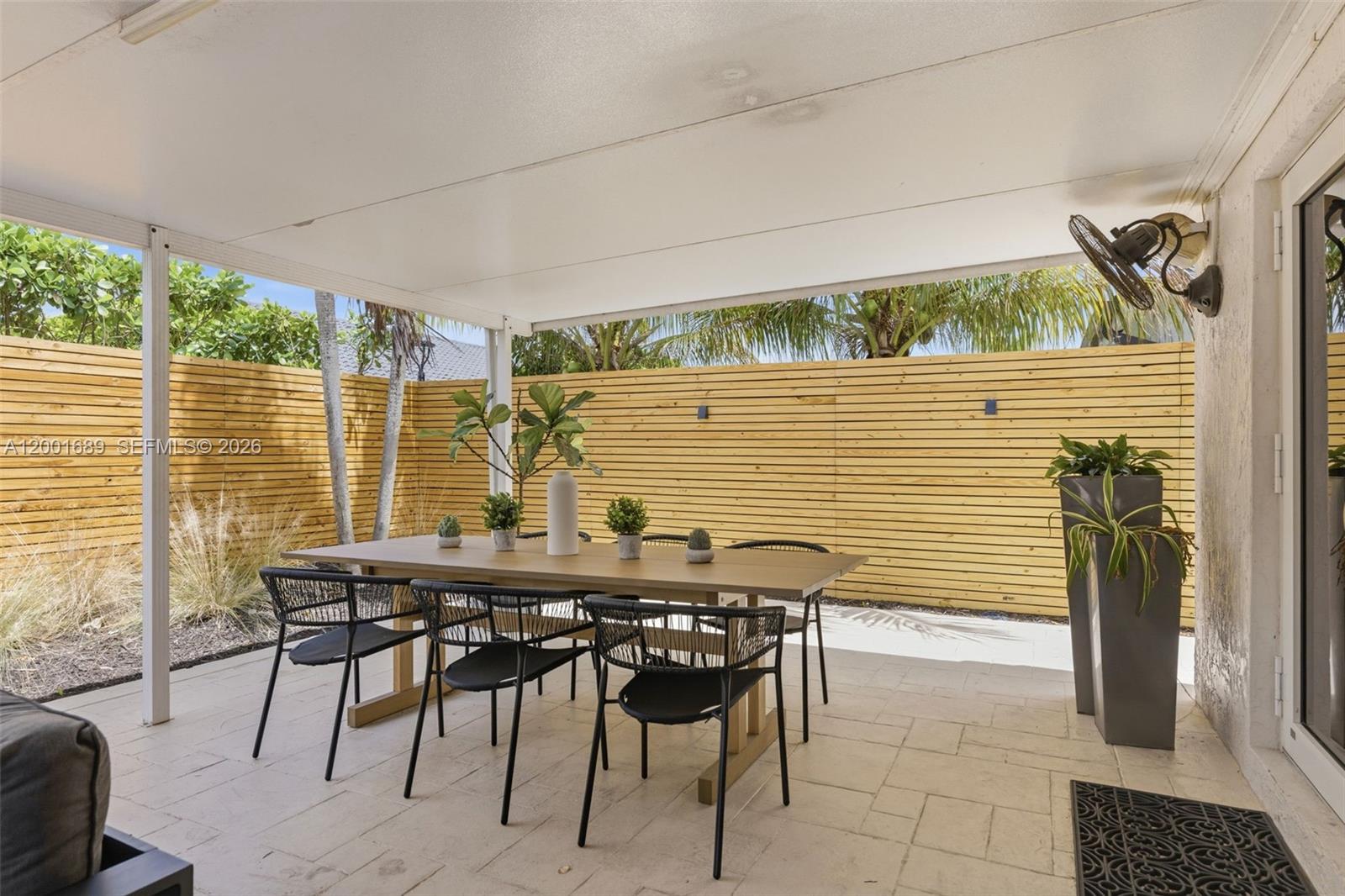 14491 Southwest 161 Street Miami, FL 33177 - Photo 45 of 55 a view of an outdoor dining space with furniture