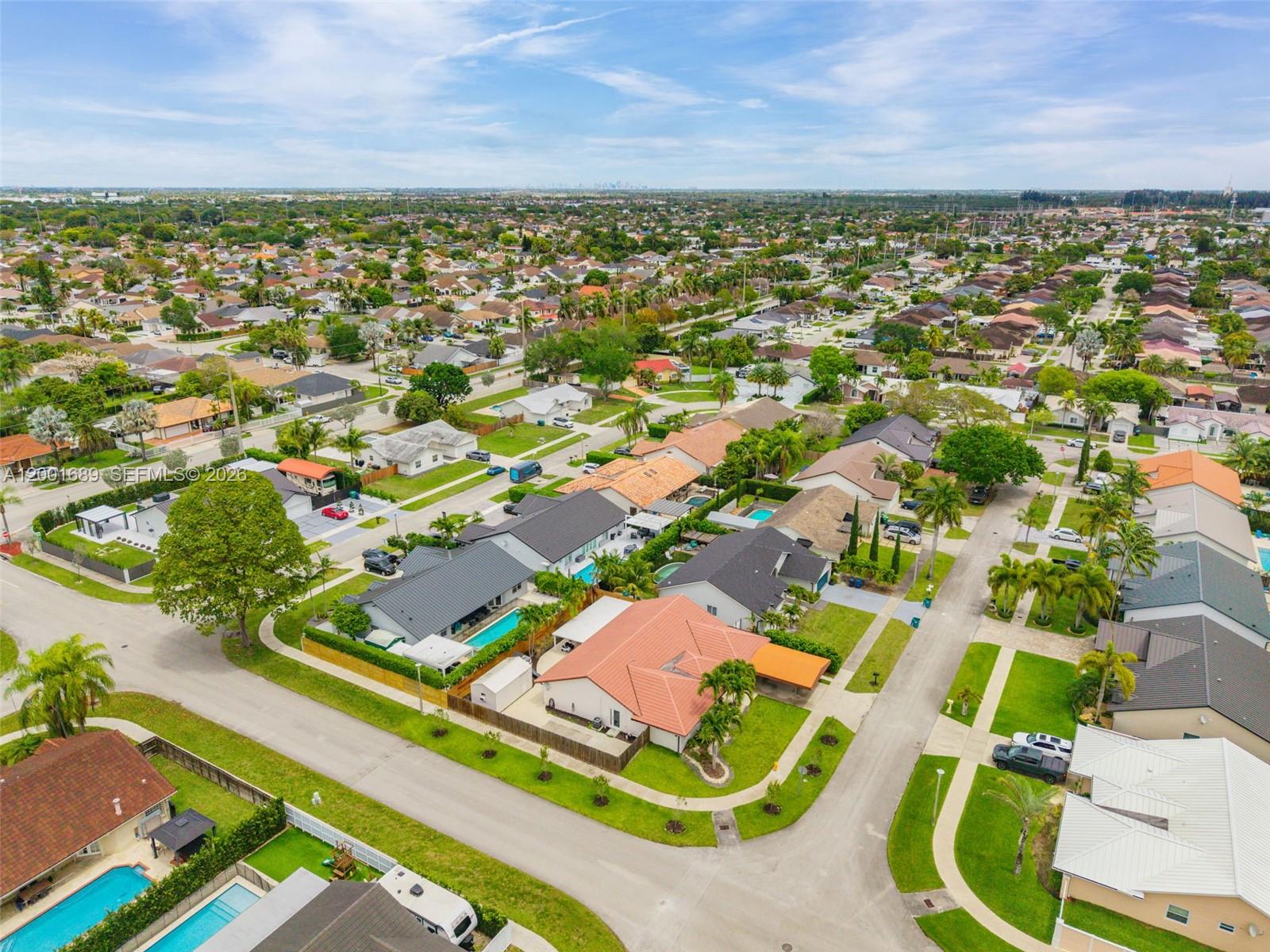 14491 Southwest 161 Street Miami, FL 33177 - Photo 55 of 55 an aerial view of residential houses with outdoor space
