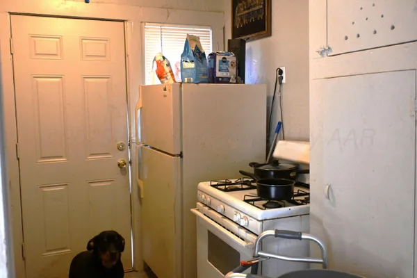 a close view of a refrigerator and washing machine