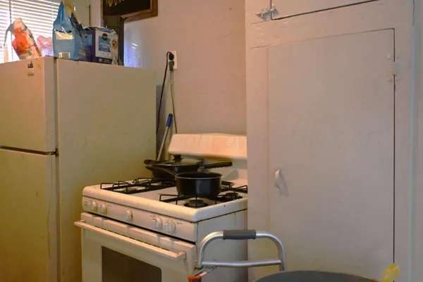 a view of storage and utility room with washer and dryer