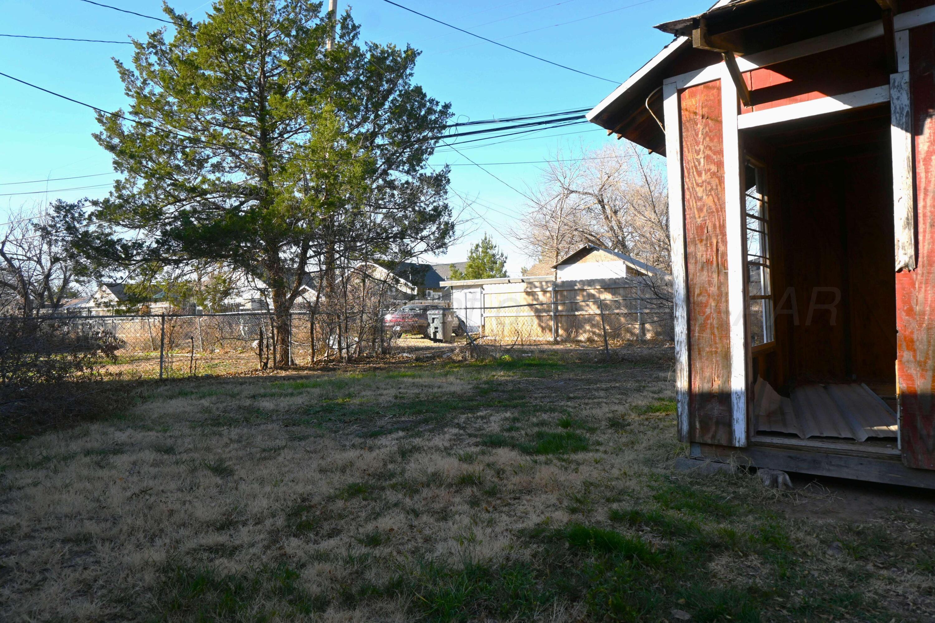 3702 South Polk Street Amarillo, TX 79110 - Photo 10 of 19 a view of a back yard