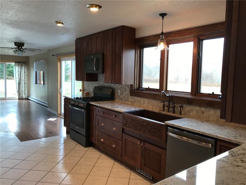 28 Ripley Road Cambridge, ME 04923 - Photo 3 of 35 Hickory cabinets, copper sink and...