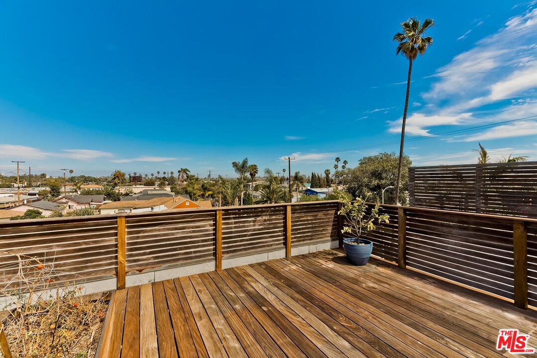 705 Sunset Avenue, Unit 1/2 Venice, CA 90291 - Photo 14 of 16 a view of a balcony with wooden floor