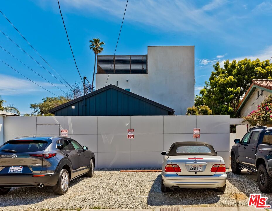 705 Sunset Avenue, Unit 1/2 Venice, CA 90291 - Photo 16 of 16 a car parked in front of a house