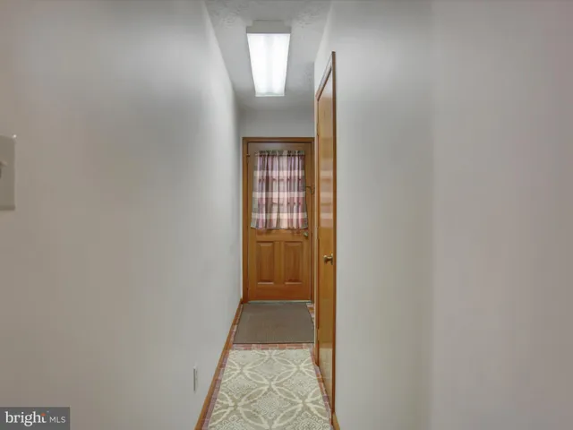 a kitchen with a sink cabinets and appliances