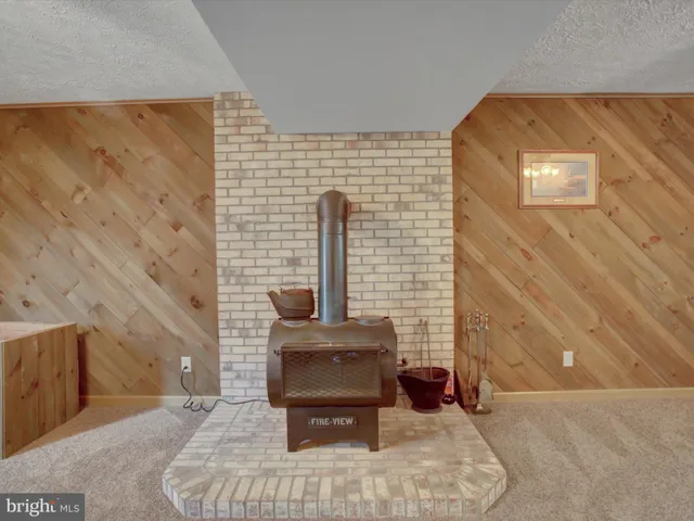 a view of a livingroom with a fireplace