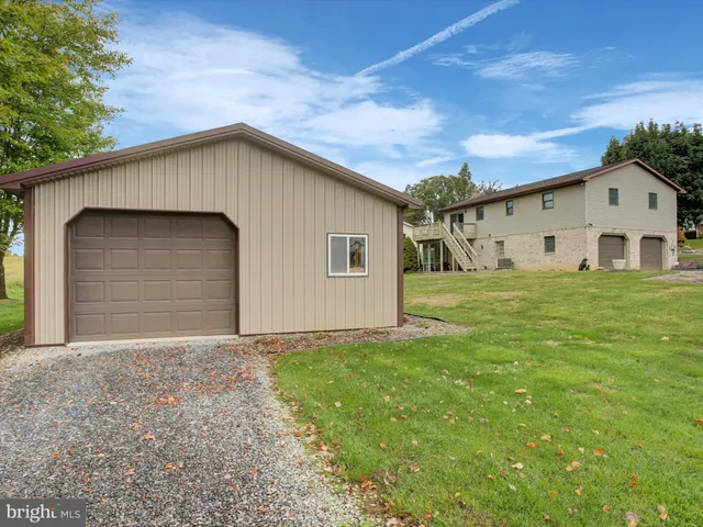 a room with gym equipment and a mirror