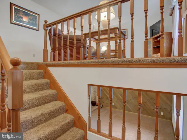 a view of staircase with large window