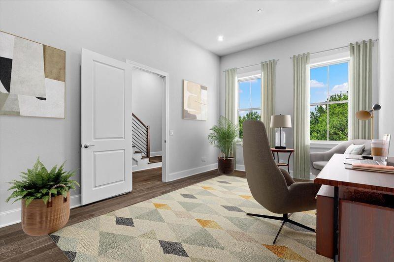 1308 East Crosby Road Carrollton, TX 75006 - Photo 13 of 21 a workspace with furniture window and wooden floor