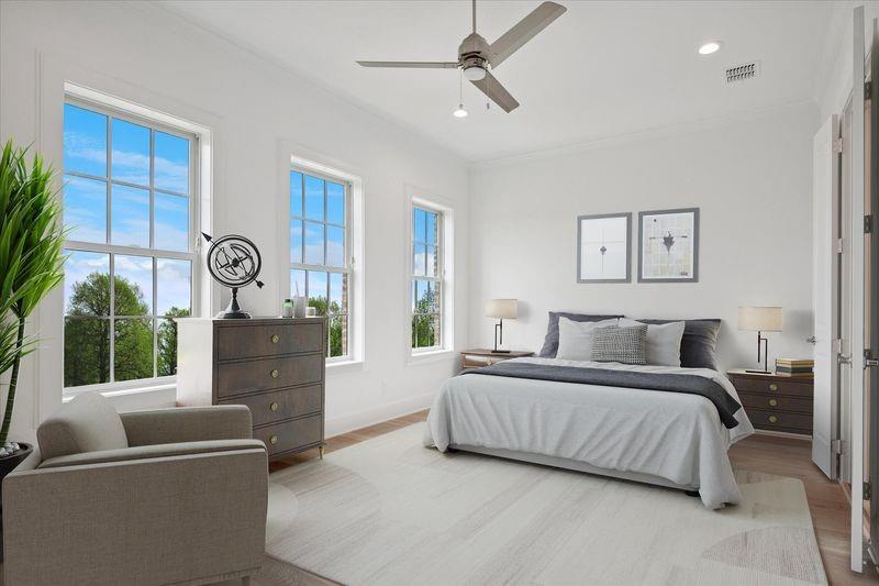 1308 East Crosby Road Carrollton, TX 75006 - Photo 10 of 21 a bedroom with a bed and a chandelier