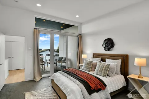 a bathroom with a double vanity sink and mirror