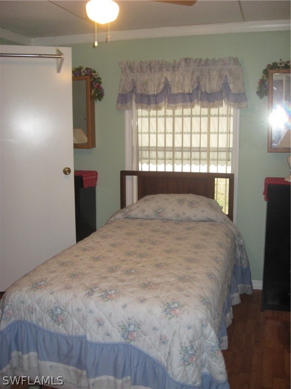 1260 Old Bridge Road North Fort Myers, FL 33917 - Photo 14 of 29 a bedroom with a bed and a large mirror