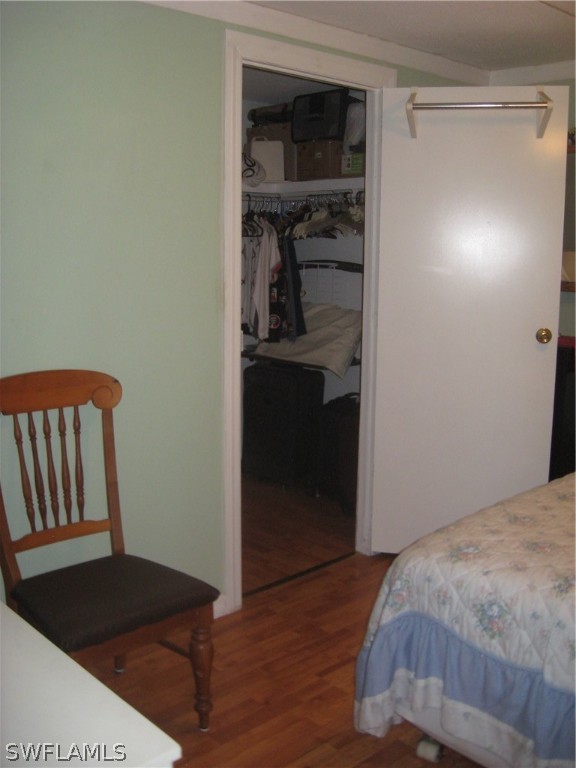 1260 Old Bridge Road North Fort Myers, FL 33917 - Photo 15 of 29 a bedroom with a bed and dresser