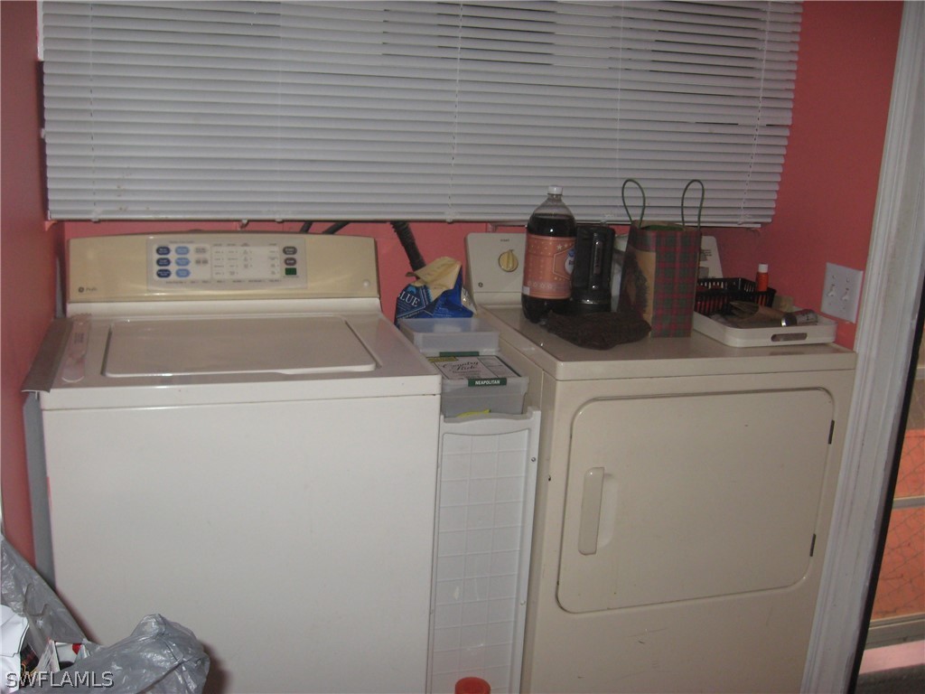 1260 Old Bridge Road North Fort Myers, FL 33917 - Photo 16 of 29 a utility room with dryer and washer