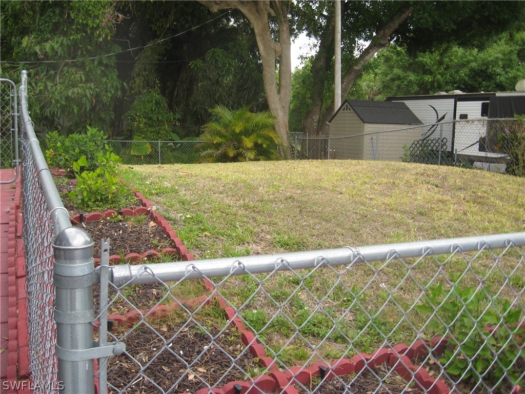 1260 Old Bridge Road North Fort Myers, FL 33917 - Photo 19 of 29 a view of a backyard