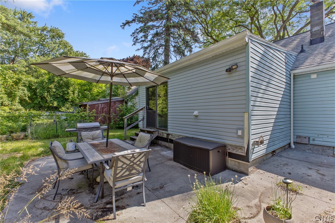 125 Circle Road Salina, NY 13212 - Photo 36 of 39 Nice size backyard, fully fenced in with several garden beds and a patio space, great for entertaining!