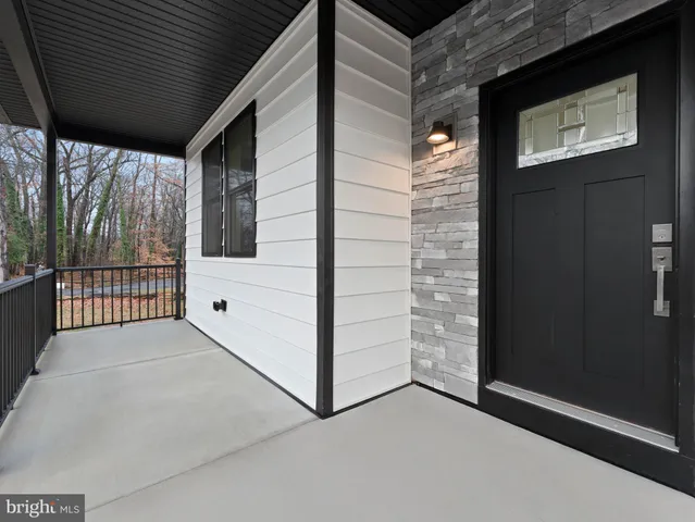 a view of a hallway with staircase