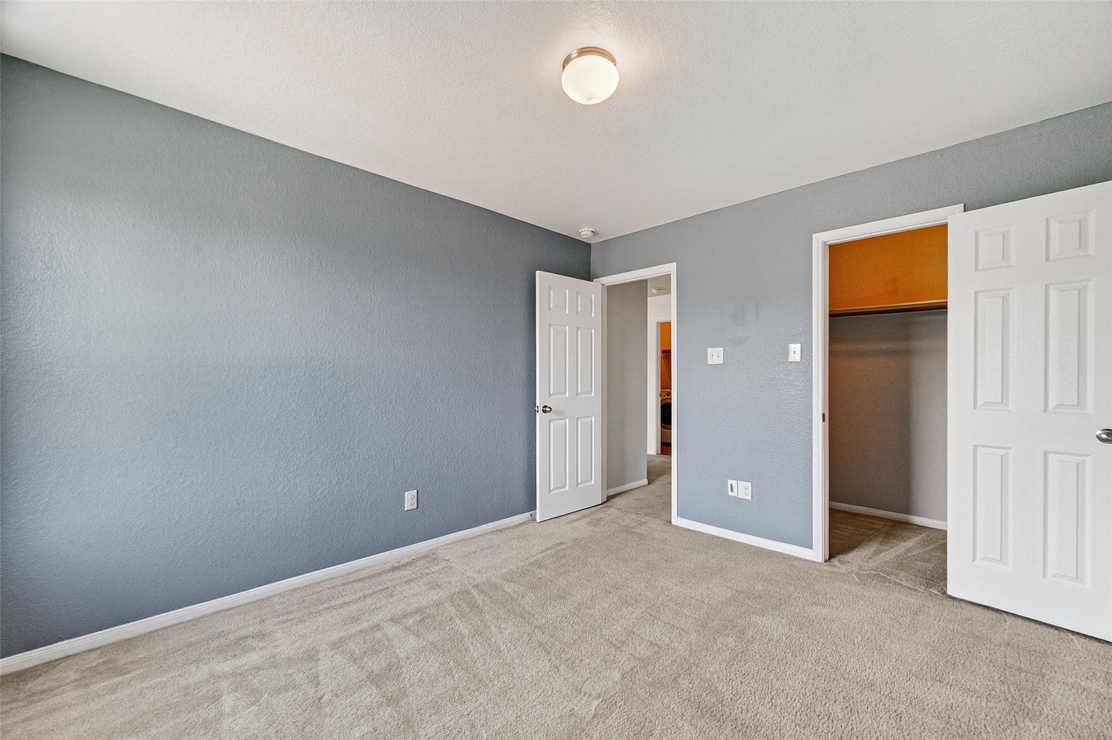 2702 Modano Court Fresno, TX 77545 - Photo 32 of 46 an empty room with closet and mirror