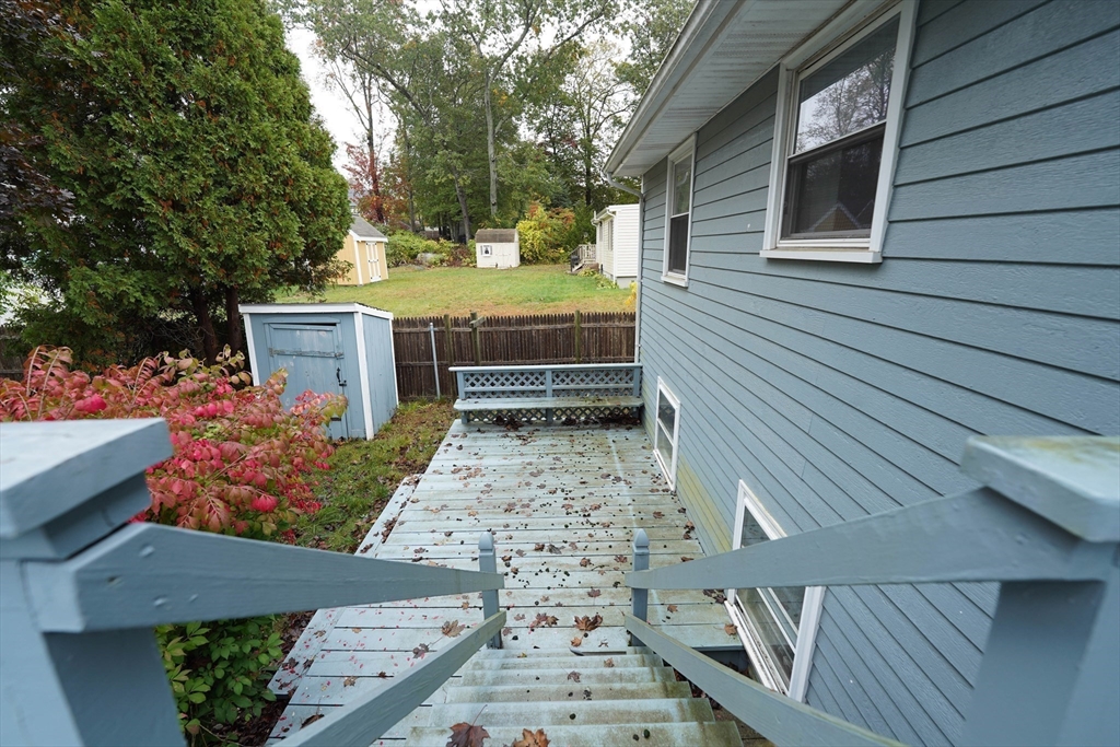 1069 Cherokee Street New Bedford, MA 02745 - Photo 18 of 21 a view of a backyard