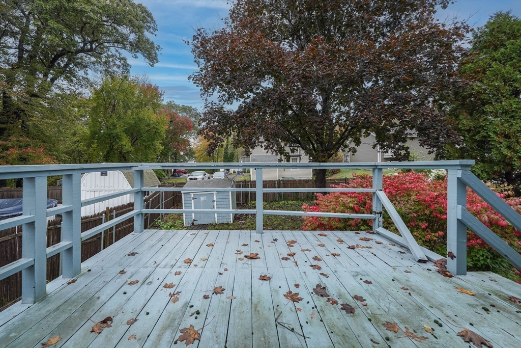 1069 Cherokee Street New Bedford, MA 02745 - Photo 20 of 21 a view of a deck with wooden floor and outer view