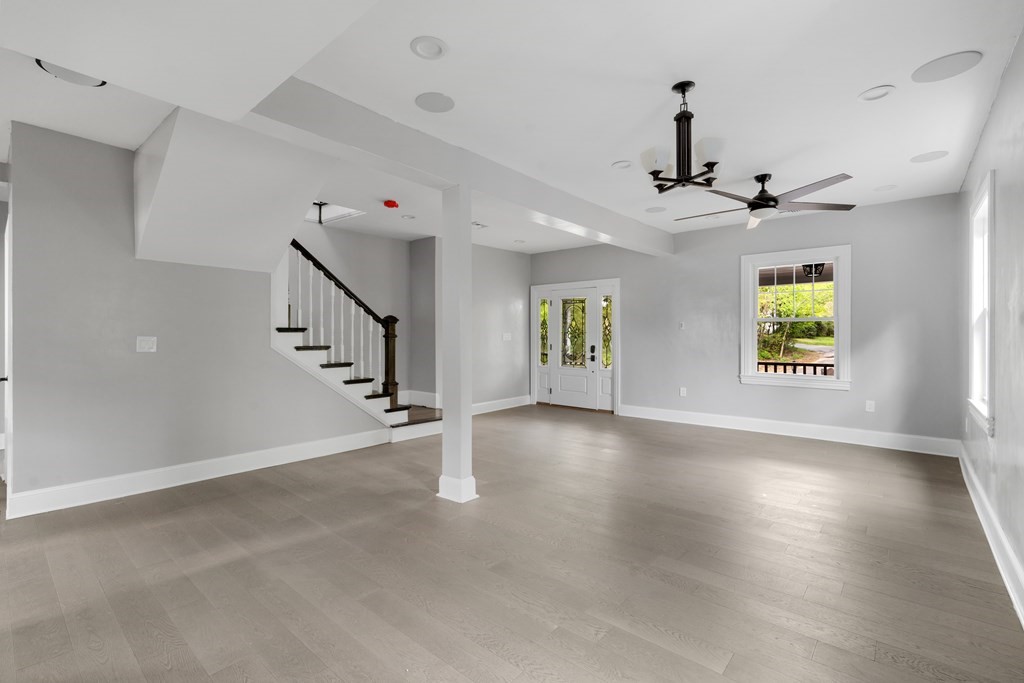 187 Indian Lane Canton, MA 02021 - Photo 16 of 26 wooden floor in an empty room with a window