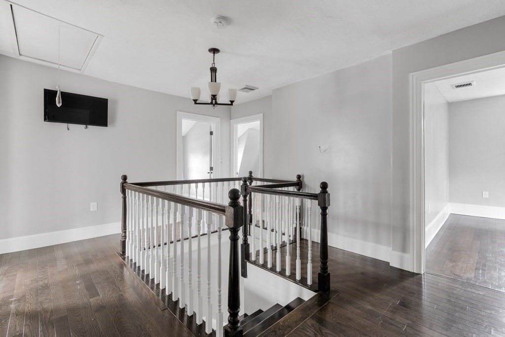 187 Indian Lane Canton, MA 02021 - Photo 20 of 26 a view of entryway and hall with wooden floor
