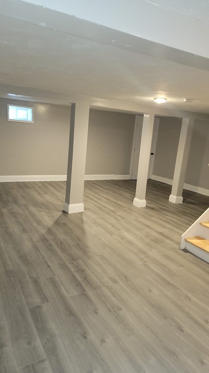 187 Indian Lane Canton, MA 02021 - Photo 25 of 26 a view of empty room with wooden floor
