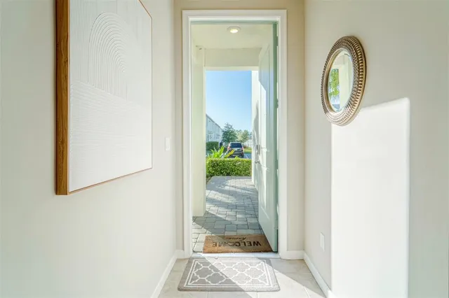 a view of a wooden door with a door in front of it