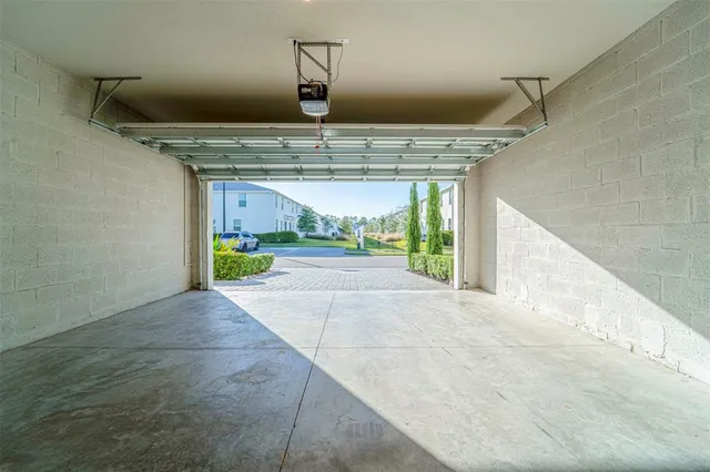 a swimming pool view with a seating space