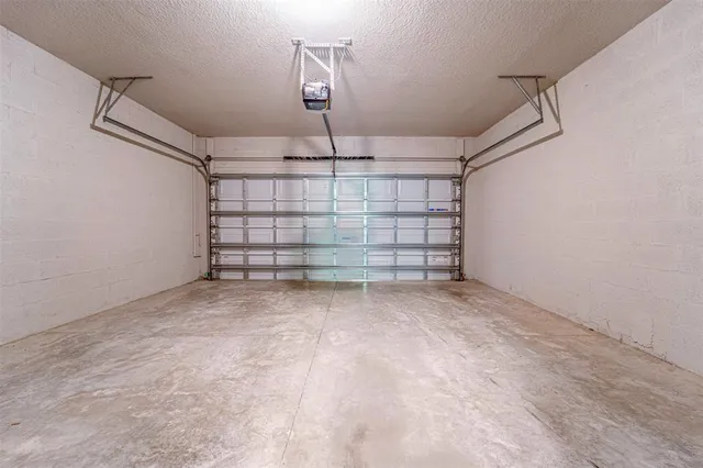 a view of a swimming pool with chairs