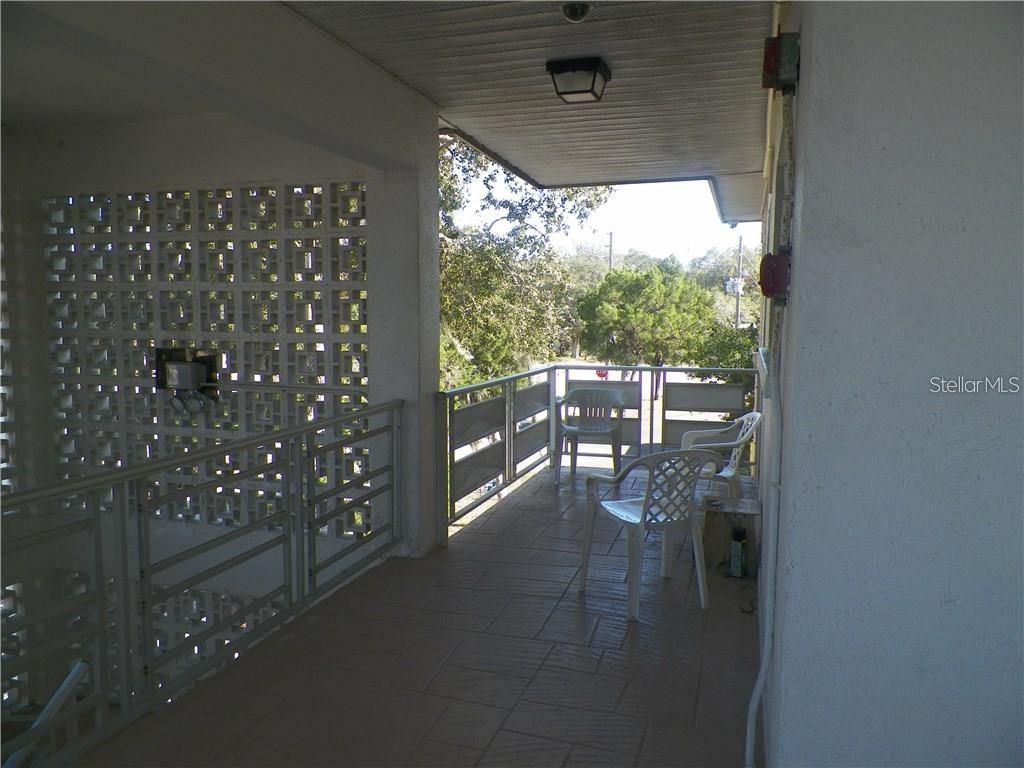 911 Washington Avenue Southwest, Unit 304 Largo, FL 33770 - Photo 22 of 26 a dining room with furniture