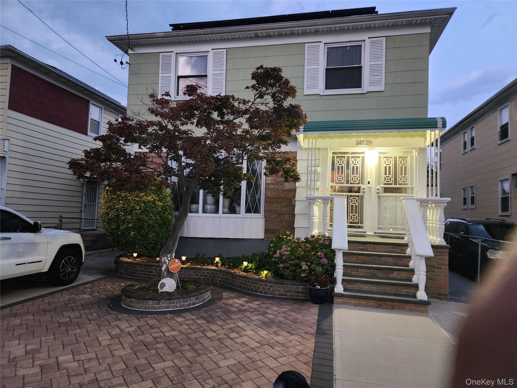 147-29 227th Street Queens, NY 11413 - Photo 1 of 1 View of american foursquare style home