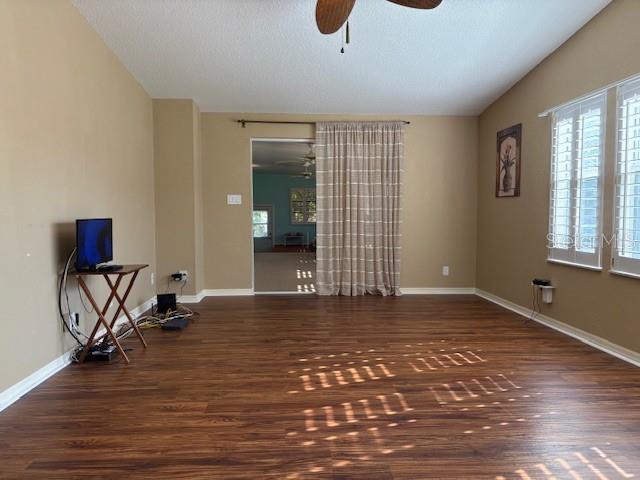 1894 Elizabeth Lane Mount Dora, FL 32757 - Photo 31 of 69 a view of empty room with wooden floor and fan