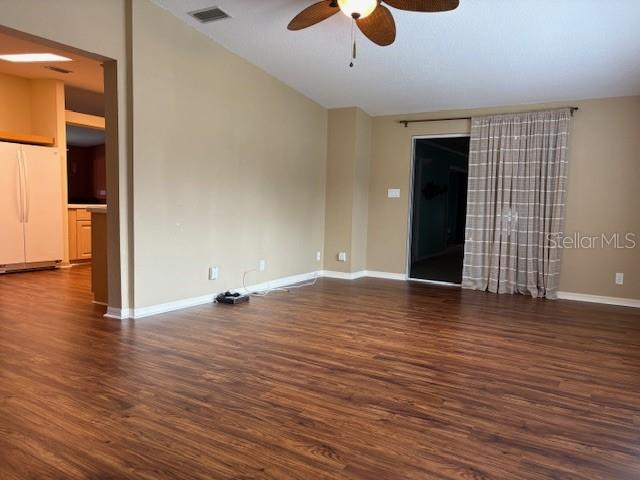 1894 Elizabeth Lane Mount Dora, FL 32757 - Photo 34 of 69 an empty room with wooden floor and windows