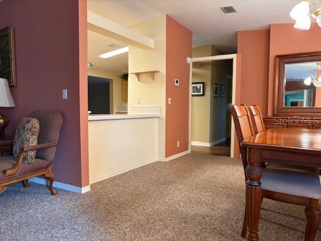 1894 Elizabeth Lane Mount Dora, FL 32757 - Photo 5 of 69 a view of room with furniture and a chandelier