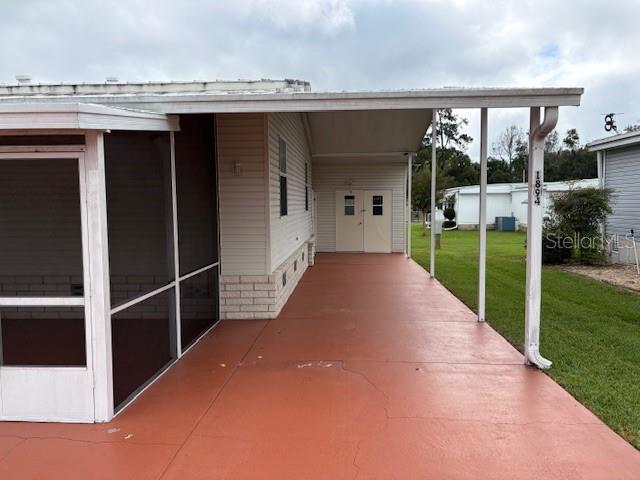 1894 Elizabeth Lane Mount Dora, FL 32757 - Photo 58 of 69 a view of a house with backyard and porch