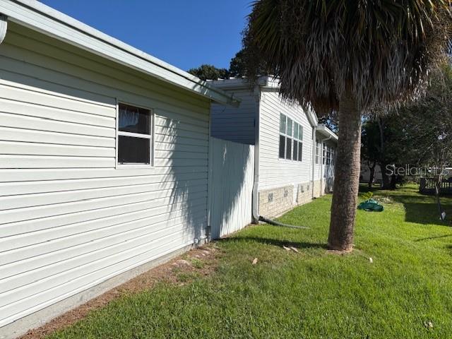 1894 Elizabeth Lane Mount Dora, FL 32757 - Photo 65 of 69 a front view of a house with garden
