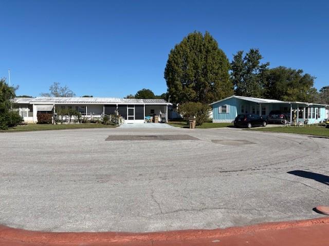 1894 Elizabeth Lane Mount Dora, FL 32757 - Photo 69 of 69 a view of city with tall buildings