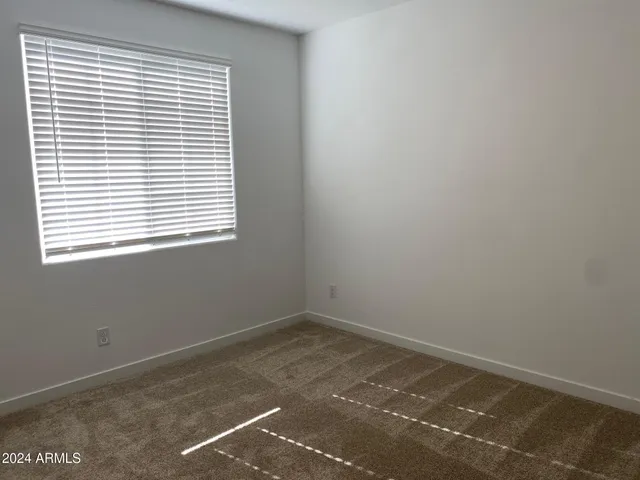 a view of a room with a window