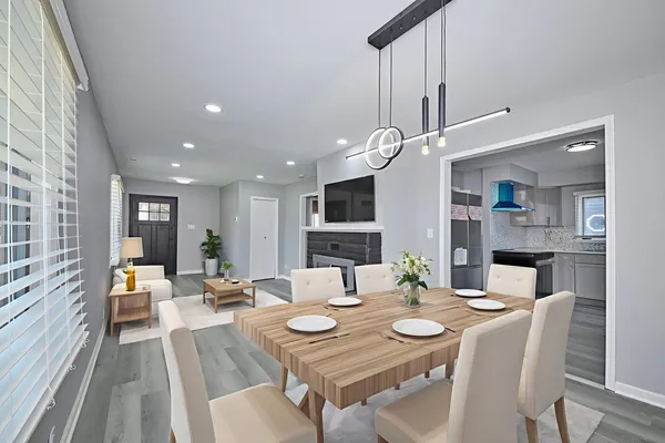 a living room with furniture and a table