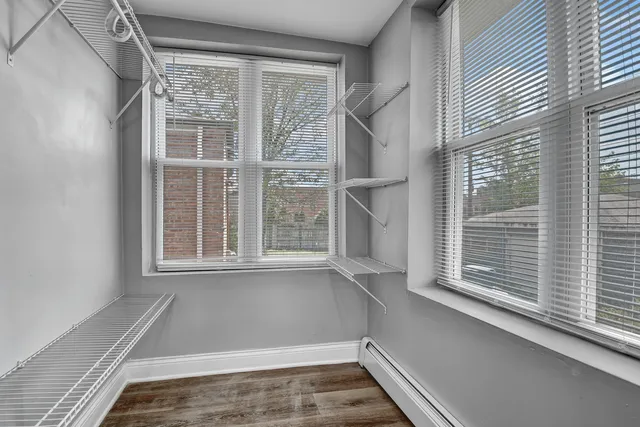 a view of a room with a large window