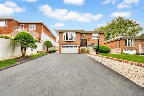 front view of a house with a street